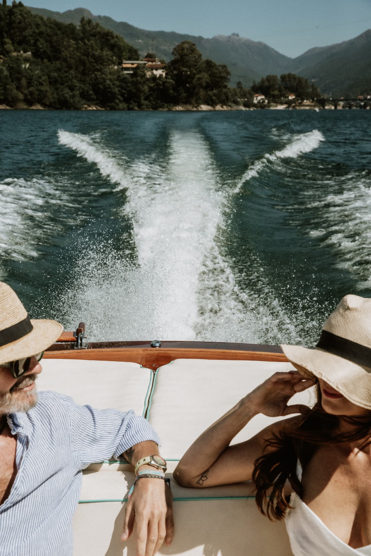 Wake trailing behind the Pedrazzini on the water